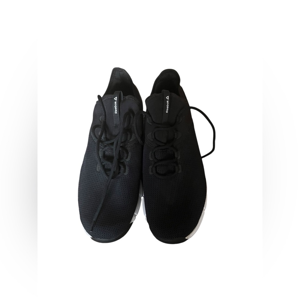Brand new Reebok slip ons